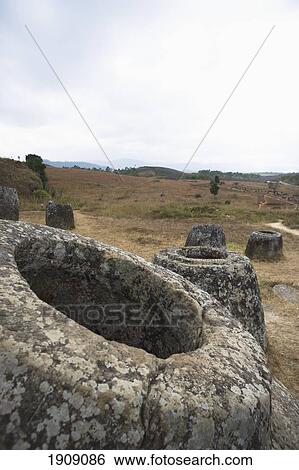 Plain Of Jars In Xieng Khuang Province, Northern Laos View Large Photo Image Stock Photograph - Plain Of Jars In Xieng Khuang Province, Northern Laos. Fotosearch
