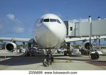 Stock Photo - Plane On Tarmac, Princess Juliana Airport; Sint Maarten, Dutch West Indies. Fotosearch