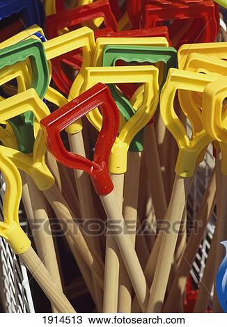 Plastic Spade Handles For Sale View Large Photo Image Stock Image - Plastic Spade Handles For Sale. Fotosearch