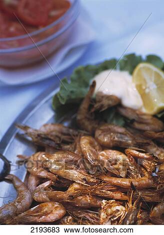 Stock Image - Plate Of Grilled Prawns In Restaurant On The Small Island Of Sveti Klement Off Hvar Town, Hvar, Croatia.. Fotosearch