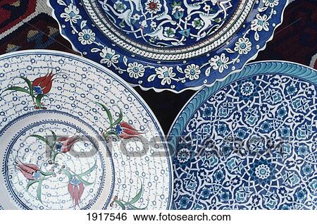 Stock Photograph - Plates Covered With Ornaments. Fotosearch