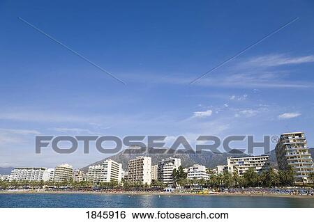 Playa De La Fontanilla; Marbella, Malaga Province, Costa Del Sol, Spain View Large Photo Image Stock Photograph - Playa De La Fontanilla; Marbella, Malaga Province, Costa Del Sol, Spain. Fotosearch