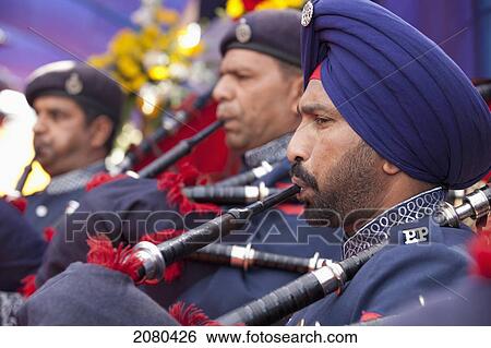 Playing Bagpipes For An Indian Wedding; Ludhiana, Punjab, India View Large Photo Image Stock Photograph - Playing Bagpipes For An Indian Wedding; Ludhiana, Punjab, India. Fotosearch
