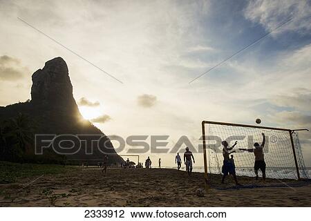 Playing Football In Praia Da Conceicao, Unesco World Heritage Site; Praia Da Cachorro, Fernando De Noronha, Pernambuco, Brazil View Large Photo Image Stock Image - Playing Football In Praia Da Conceicao, Unesco World Heritage Site; Praia Da Cachorro, Fernando De Noronha, Pernambuco, Brazil. Fotosearch