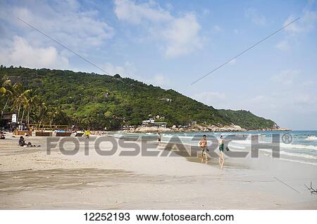 Playing on the beaches of Haad Rin; Ko Phangan, Thailand View Large Photo Image Stock Image - Playing on the beaches of Haad Rin; Ko Phangan, Thailand. Fotosearch
