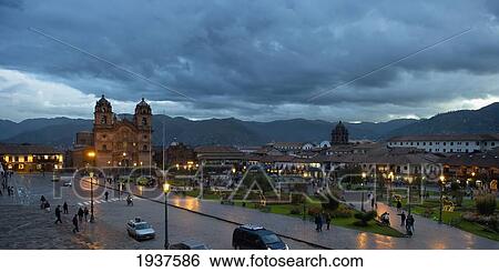 Stock Photograph - Plaza De Armas With Templo De La Compania De Jesus In The Background; Cusco Peru. Fotosearch