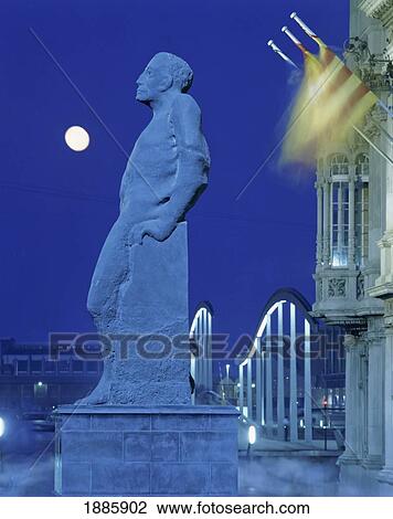 Stock Image - Plaza Portal De La Pau With Barcelona Marina And Moon. Fotosearch