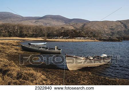 Stock Image - Pleasure boats in Upper Lake of Lough Leane, Killarney National Park; County Kerry, Ireland, UK. Fotosearch