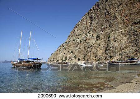 Stock Image - Pleasure Cruise Boat From Oludeniz In Butterfly Bay, The Turquoise Coast, Southern Turkey. Fotosearch