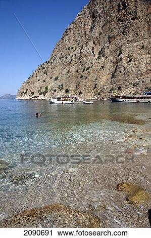 Stock Image - Pleasure Cruise Boat From Oludeniz In Butterfly Bay, The Turquoise Coast, Southern Turkey. Fotosearch