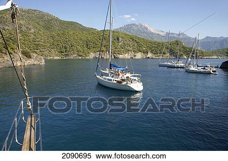 Pleasure Cruise Boats From Oludeniz, In Coldwater Bay, The Turquoise Coast, Southern Turkey View Large Photo Image Stock Photography - Pleasure Cruise Boats From Oludeniz, In Coldwater Bay, The Turquoise Coast, Southern Turkey. Fotosearch
