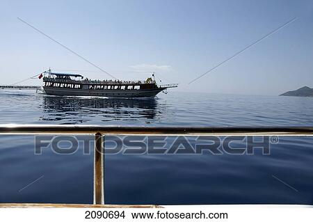Pleasure Cruise Boats From Oludeniz, The Turquoise Coast, Southern Turkey View Large Photo Image Picture - Pleasure Cruise Boats From Oludeniz, The Turquoise Coast, Southern Turkey. Fotosearch
