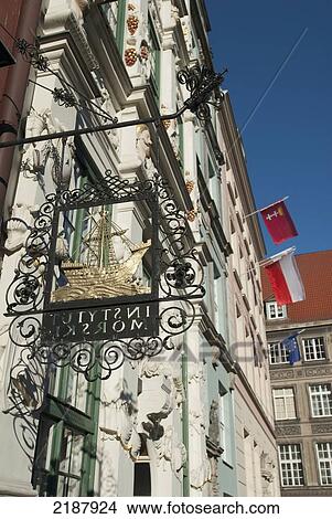 Poland, Old Town District; Gdansk, Old Merchant Sign On Richly-Decorated Facade Of Golden House On Dlugi Targ Street View Large Photo Image Picture - Poland, Old Town District; Gdansk, Old Merchant Sign On Richly-Decorated Facade Of Golden House On Dlugi Targ Street. Fotosearch
