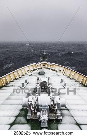 Stock Photography - Polar Star icebreaker, snow covered deck in the Southern Ocean; Antarctica. Fotosearch