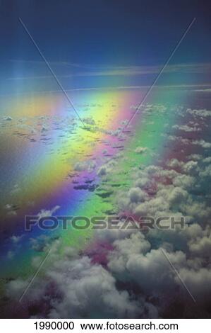 Polarized Rainbow And Aerial Of Clouds Over The Ocean View Large Photo Image Stock Image - Polarized Rainbow And Aerial Of Clouds Over The Ocean. Fotosearch