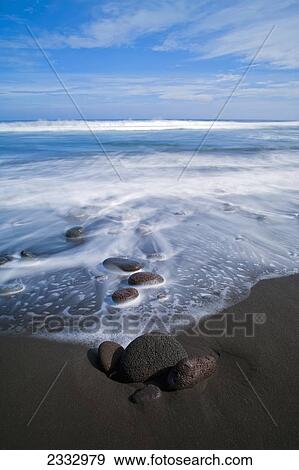 Pololu black sand beach and clear blue skies, Pololu Valley; Big Island, Hawaii, United States of America View Large Photo Image Stock Photo - Pololu black sand beach and clear blue skies, Pololu Valley; Big Island, Hawaii, United States of America. Fotosearch