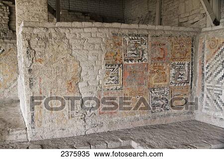 Stock Photography - Polychrome Moche friezes depicting mythical birds in the ceremonial precinct where the Royal Tomb of the Lady of Cao and her escorts was found at Huaca Cao Viejo (or Huaca Blanca) at El Brujo Archaeological Complex, La Libertad, Peru. Fotosearch