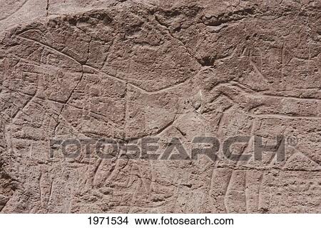 Picture - Pona Petroglyphs On The Cliffs By The Loa River, Antofagasta Region, Chile. Fotosearch