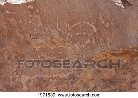 Pona Petroglyphs On The Cliffs By The Loa River, Antofagasta Region, Chile View Large Photo Image Stock Photo - Pona Petroglyphs On The Cliffs By The Loa River, Antofagasta Region, Chile. Fotosearch