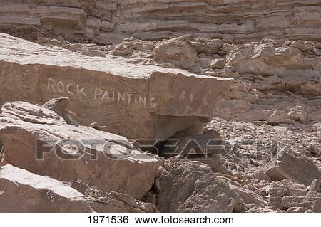Stock Photograph - Pona Petroglyphs On The Cliffs By The Loa River, Antofagasta Region, Chile. Fotosearch
