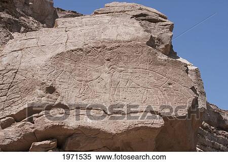 Stock Photography - Pona Petroglyphs On The Cliffs By The Loa River, Antofagasta Region, Chile. Fotosearch
