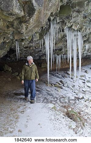 Ponytail Falls, Columbia River Gorge, Oregon, Usa; Hiker Examining Cave Icicles View Large Photo Image Stock Image - Ponytail Falls, Columbia River Gorge, Oregon, Usa; Hiker Examining Cave Icicles. Fotosearch