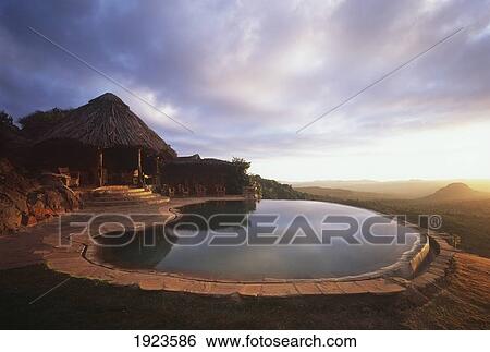 Stock Photograph - Pool At Sunset. Fotosearch
