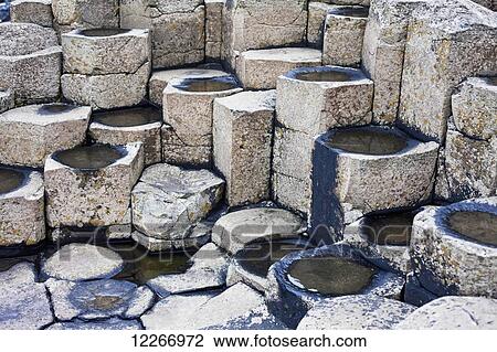 Pools of water formed in the columns of Giant's Causeway, Causeway Coast; County Antrim, Ireland View Large Photo Image Stock Image - Pools of water formed in the columns of Giant's Causeway, Causeway Coast; County Antrim, Ireland. Fotosearch
