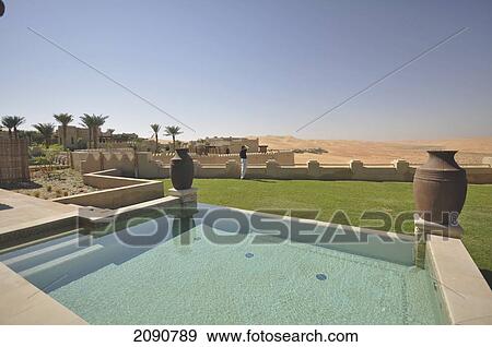 Poolside Villa In Qasr Al Sarab, Abu Dhabi View Large Photo Image Stock Photo - Poolside Villa In Qasr Al Sarab, Abu Dhabi. Fotosearch