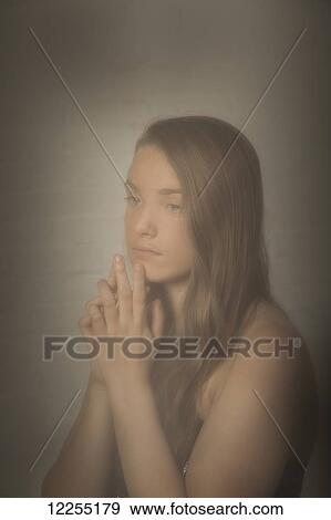 Stock Photo - Portait of a teenage girl; Connecticut, United States of America. Fotosearch