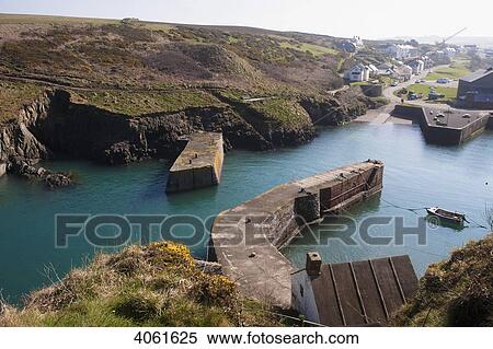 Stock Photography - Porthgain harbour on Pembrokeshire Coast Path, South West Wales; Pembrokeshire, Wales. Fotosearch