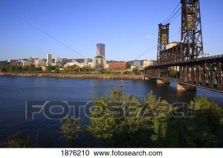 Stock Image - Portland, Oregon, United States Of America; View Of The City And Burnside Bridge Along The Willamette River. Fotosearch
