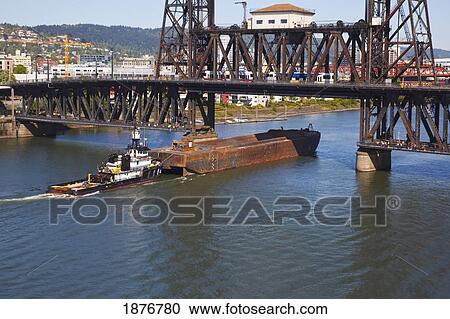 Stock Image - Portland, Oregon, United States Of America; Downtown Portland And A Bridge Across Willamette River. Fotosearch
