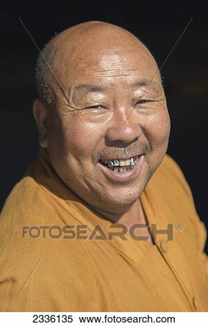 Portrait Of A Bald Man With A Big Smile; Jiuquan, Gansu, China View Large Photo Image Stock Photography - Portrait Of A Bald Man With A Big Smile; Jiuquan, Gansu, China. Fotosearch