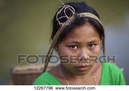 Portrait of a Chakma woman; Khagrachari, Chittagong Division, Bangladesh View Large Photo Image Stock Photo - Portrait of a Chakma woman; Khagrachari, Chittagong Division, Bangladesh. Fotosearch