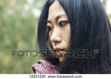 Stock Image - Portrait of a Chinese young woman; Xiamen, China. Fotosearch