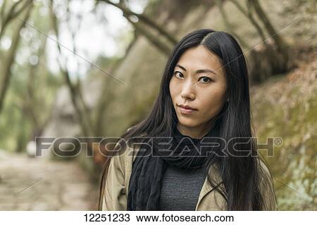 Portrait of a chinese young woman; Xiamen, China View Large Photo Image Stock Image - Portrait of a chinese young woman; Xiamen, China. Fotosearch