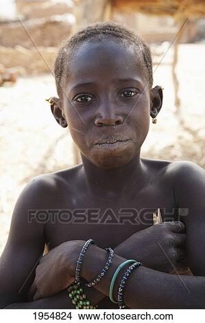 Portrait of a Fulani girl in Youga, Mali View Large Photo Image Picture - Portrait of a Fulani girl in Youga, Mali. Fotosearch