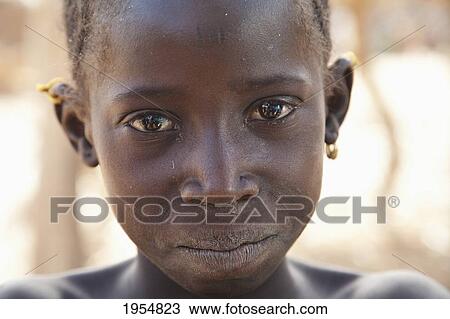 Portrait of a Fulani girl in Youga, Mali View Large Photo Image Stock Image - Portrait of a Fulani girl in Youga, Mali. Fotosearch