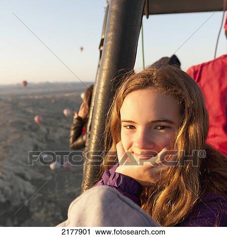 Portrait Of A Girl In A Hot Air Balloon; Goreme Nevsehir Turkey View Large Photo Image Stock Image - Portrait Of A Girl In A Hot Air Balloon; Goreme Nevsehir Turkey. Fotosearch