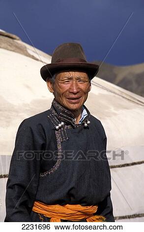Stock Photograph - Portrait Of A Local Man Outsie His Ger Tent, Gobi Desert, Mongolia. Fotosearch