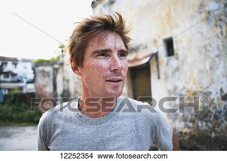 Picture - Portrait of a male tourist; Penang, Malaysia. Fotosearch
