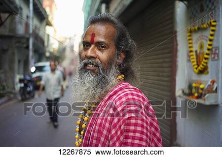 Portrait of a man on the street; Kolkata, West Bengal, India View Large Photo Image Stock Photography - Portrait of a man on the street; Kolkata, West Bengal, India. Fotosearch