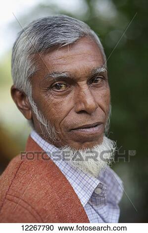 Portrait of a man; Sunamganj, Bangladesh View Large Photo Image Stock Image - Portrait of a man; Sunamganj, Bangladesh. Fotosearch