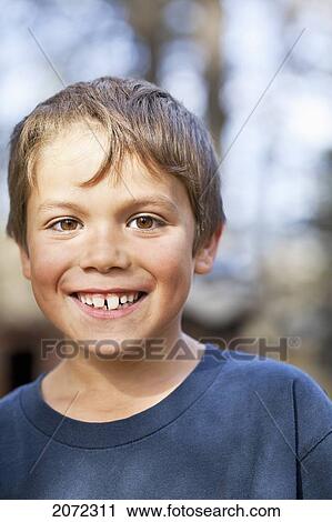 Portrait Of A Smiling Young Boy, Gimli, Manitoba, Canada View Large Photo Image Stock Image - Portrait Of A Smiling Young Boy, Gimli, Manitoba, Canada. Fotosearch