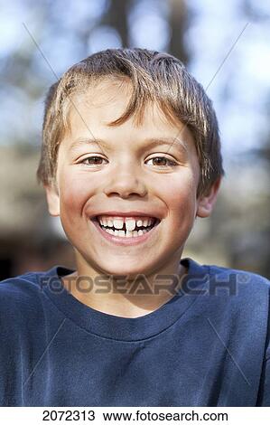 Portrait Of A Smiling Young Boy, Gimli, Manitoba, Canada View Large Photo Image Stock Image - Portrait Of A Smiling Young Boy, Gimli, Manitoba, Canada. Fotosearch