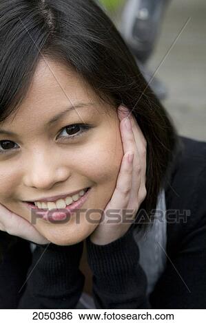 Stock Photograph - Portrait Of A Teenage Girl. Fotosearch
