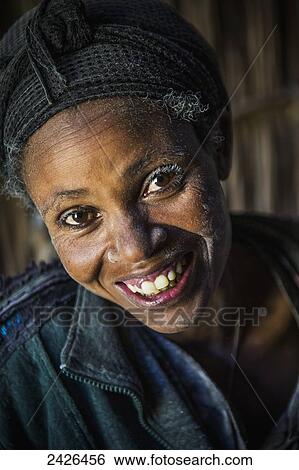 Portrait of a woman in a grain mill with flour in hair and on face; Ethiopia View Large Photo Image Stock Photograph - Portrait of a woman in a grain mill with flour in hair and on face; Ethiopia. Fotosearch