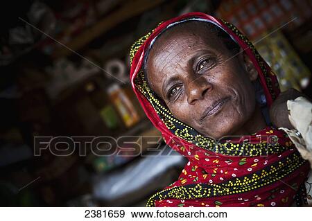 Portrait of a woman in a headscarf; Ethiopia View Large Photo Image Stock Photo - Portrait of a woman in a headscarf; Ethiopia. Fotosearch