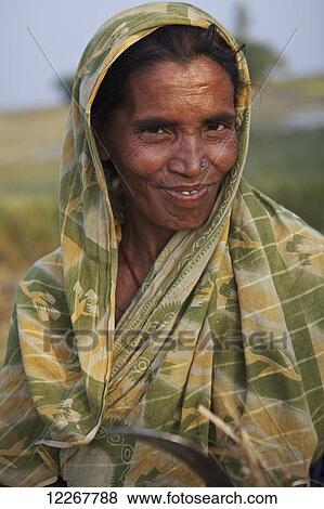 Portrait of a woman; Sunamganj, Bangladesh View Large Photo Image Stock Photo - Portrait of a woman; Sunamganj, Bangladesh. Fotosearch